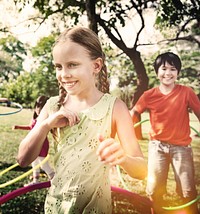Group of Children Playing Hulahoop Concept