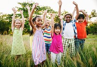 Group of diverse kids playing in the park