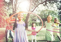 Children Playing Hula Hoop Activity Concept