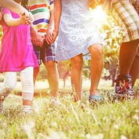 Cute diverse kids playing in the park