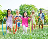 Cute diverse kids playing in the park