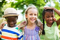 Cute diverse kids playing in the park