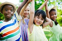 Cute diverse kids playing in the park