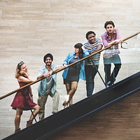 Group of diversity friends standing at staircase