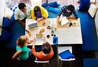 Group of diverse friends is brainstorming on their project