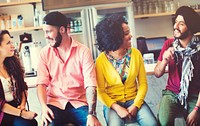 Group of friends sitting and disucussion cheerful at coffee shop