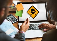 Business People Discussiion Skull Sign Danger Attention on Laptop