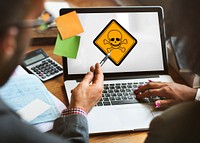 Business People Discussiion Skull Sign Danger Attention on Laptop
