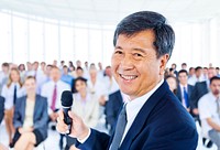 Senior man presenting at a conference