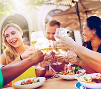 Group of friends drinking white wine