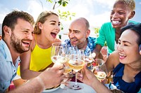 Group of friends drinking white wine