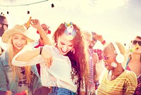 Friends dancing at a rooftop