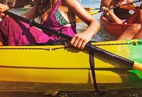 A Caucasian woman is enjoy kayaking