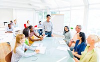 Group of Business People having a meeting in their Office
