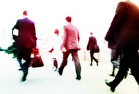 Blurred scene of crowded people walking in a rush
