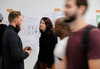 Group of diverse people attending startup business course