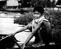 Cambodian boy by the river
