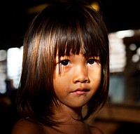 Little girl staring at the camera.