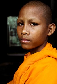 Contemplating monk, Angkor Wat, Siem Reap, Cambodia.