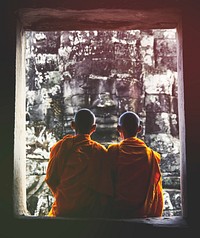 Contemplating monk, Angkor Wat, Siam Reap, Cambodia.
