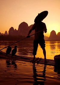 Traditional cormorant fishing, Li River, Guangxi, China.