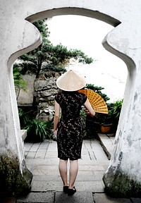 A Chinese woman in a garden