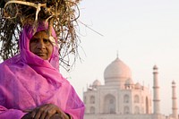 Indian woman in front of the Taj mahal