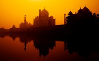 Sunset silhouette of a grand Taj Mahal