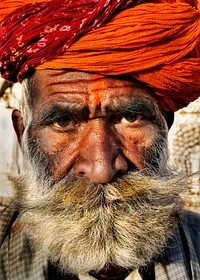 Senior Indian man looking at the camera.