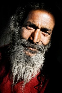Senior Indian man looking at the camera.