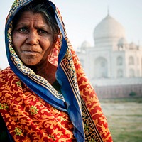 Indian woman in front of the Taj Mahal