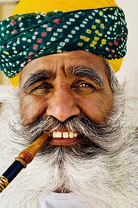 India man smoking a pipe