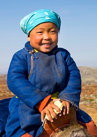 Young Tsaatan girl with a beautiful smile (reindeer people), northern Mongolia.