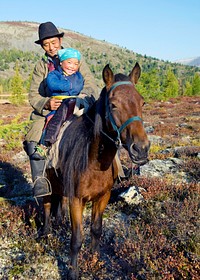 Nomadic Tsaatan or Dukha (Reindeer people) of northern Mongolia. The Tsaatan's survival is threatened by environmental damage to the forest where they live and hunt. Khovsgol aimag, Mongolia. See similar images