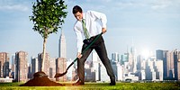 Shoveling Business District Cityscape Growth Tree Concept