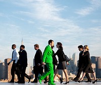 Office workers walking to their work place.