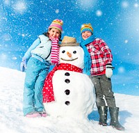 Children having fun with a Snowman.