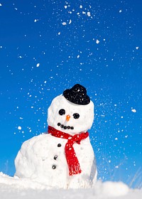 Snowman with a red scarf and black hat