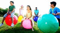 Family Outdoors Playing Ball Concept