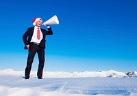 Christmas businessman with megaphone