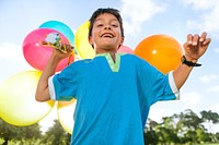 Boy with colorful balloons