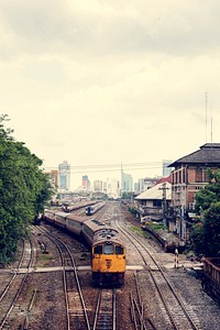 Old train arriving to Hua Lampong train station in Bangkok Thailand