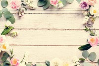 Various Fresh Flowers with Blank Design Space Wooden Background