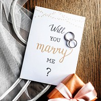 Will you marry me proposal card with wedding rings