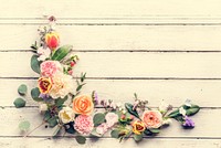 Flower decorative arrangement on wooden table