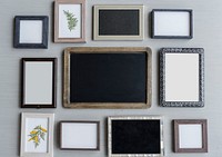 Set of Blank Photo Frames Hanging on Gray Wall