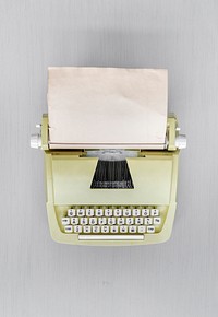 Retro Typewriter Machine on Gray Table