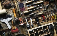 Aerial view of carpenter tools equipment set on wooden table