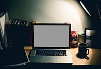 Computer laptop on wooden table