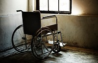 Empty wheelchair in a room
